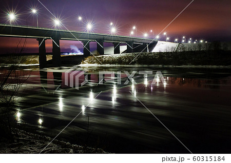 Street lights reflected on the water surface and night landscape Street lights reflected on the water surface and night landscape 60315184