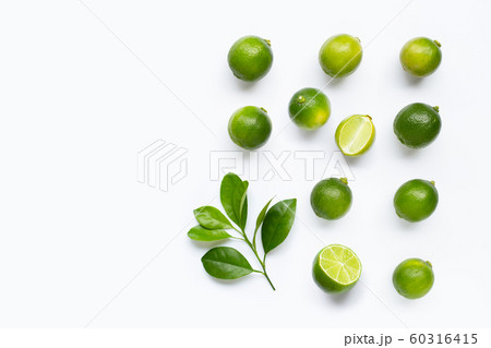 Fresh limes with leaves isolated on white Fresh limes with leaves isolated on white 60316415
