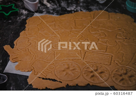 cut out gingerbread cookie in the form of a cut out gingerbread cookie in the form of a 60316487