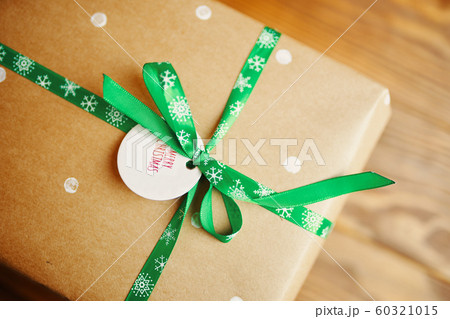 Little tag with Christmas wishes and gifts. 60321015