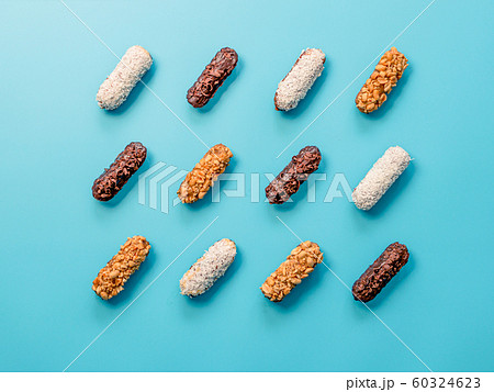 Healthy eclairs or profitroles on blue background 60324623