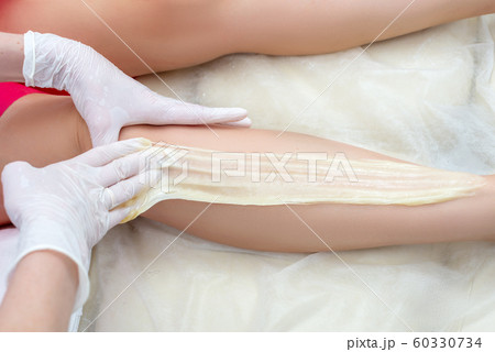 beautician hair removal procedure on the client's beautician hair removal procedure on the client's 60330734