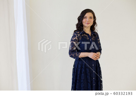 Beautiful fashionable asian woman in blue dress Beautiful fashionable asian woman in blue dress 60332193