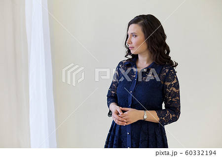 Beautiful fashionable asian woman in blue dress Beautiful fashionable asian woman in blue dress 60332194