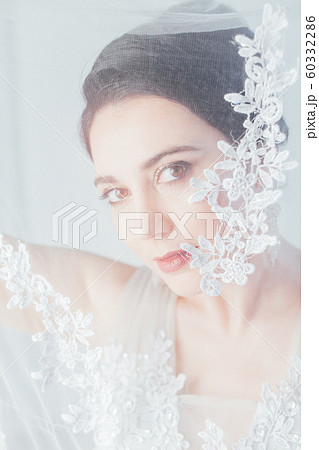 brunette woman in gray wedding gown white brunette woman in gray wedding gown white 60332286