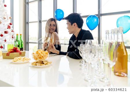 Couple celebrate new year party 60334621