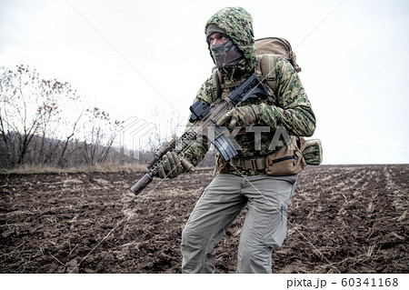 Portrait of modern army infantryman on march 60341168