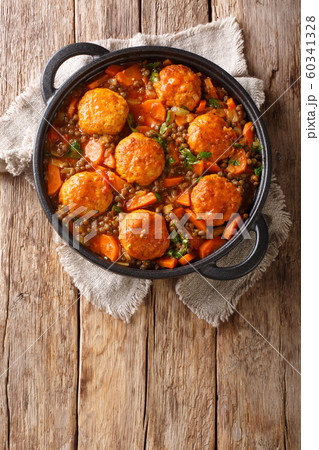Tasty meatballs served with lentils and vegetables Tasty meatballs served with lentils and vegetables 60341328