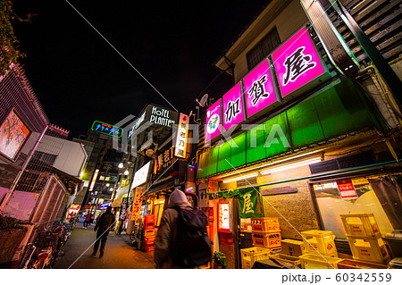 日本の東京都市景観 鶯谷のホテル街を望む 奥は鶯谷駅北口 の写真素材