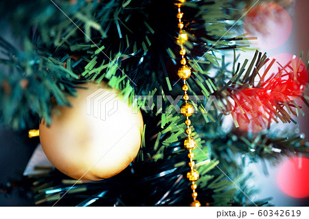 Yellow ball Christmas tree toy close up. Yellow ball Christmas tree toy close up. 60342619