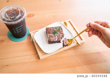 Chocolate brownies on wooden surface Chocolate brownies on wooden surface 60344588