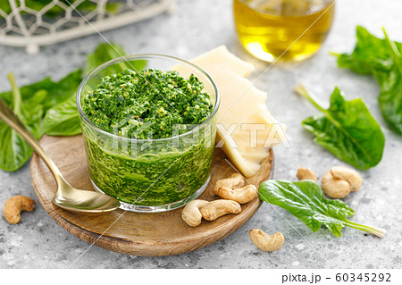 Spinach pesto sauce with cashew, parmesan cheese 60345292