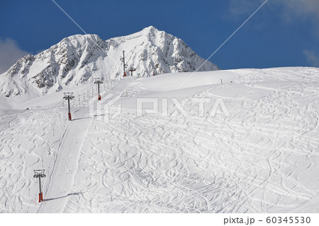 Skiing slopes sunny weather Skiing slopes sunny weather 60345530