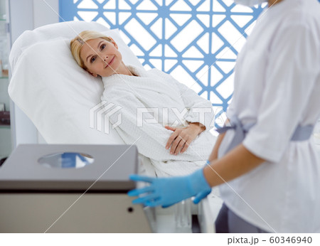 Pretty adult woman is ready for injection Pretty adult woman is ready for injection 60346940