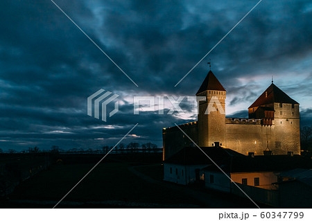 Kuressaare, Saaremaa Island, Western Estonia. Episcopal Castle In Night Lights. Traditional Medieval Architecture, Famous Attraction Landmark. Castle In Night Lighting Kuressaare, Saaremaa Island, Western Estonia. Episcopal Castle In Night Lights. Traditional Medieval Architecture, Famous Attraction Landmark. Castle In Night Lighting 60347799
