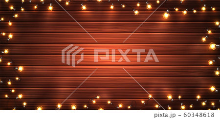 Christmas lights. Garlands on wooden background 60348618