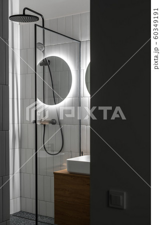 Stylish contemporary bathroom with white tiled walls Stylish contemporary bathroom with white tiled walls 60349191