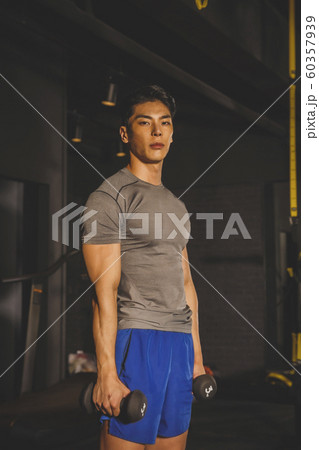 Male and female exercising in gym. Sport, fitness, weightlifting and training concept 374 Male and female exercising in gym. Sport, fitness, weightlifting and training concept 374 60357939