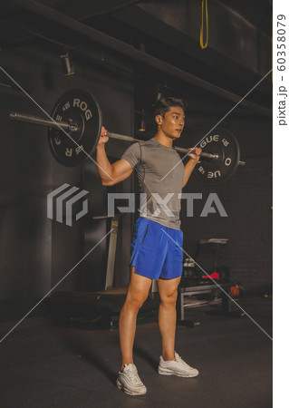 Male and female exercising in gym. Sport, fitness, weightlifting and training concept 303 Male and female exercising in gym. Sport, fitness, weightlifting and training concept 303 60358079