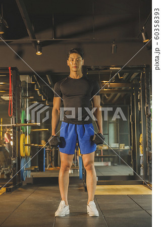 Male and female exercising in gym. Sport, fitness, weightlifting and training concept 155 Male and female exercising in gym. Sport, fitness, weightlifting and training concept 155 60358393