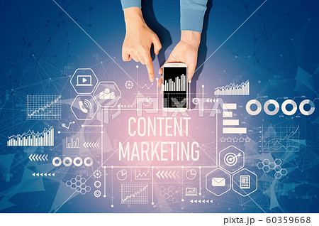 Content marketing concept with person using a smartphone 60359668