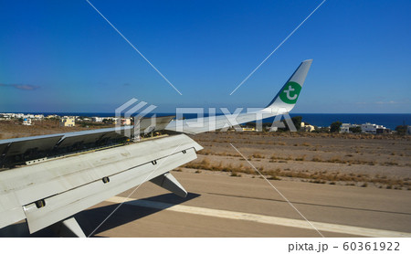 Airplane running on the airport runway Airplane running on the airport runway 60361922
