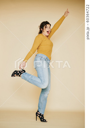 Excited happy young woman Excited happy young woman 60364722