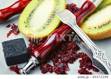 Fragrant smoking hookah with kiwi 60372299