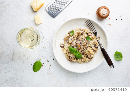 Risotto with mushrooms in a plate 60372410