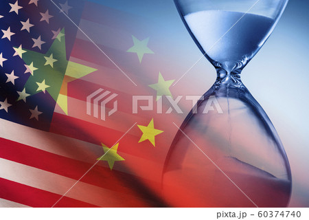 Hourglass over the flags of America and China Hourglass over the flags of America and China 60374740