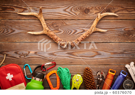 Travel items for hiking over wooden background 60376070