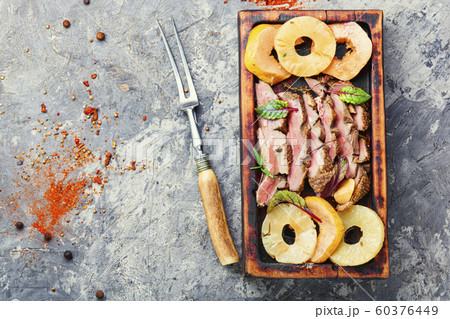 Roasted duck with pineapple 60376449