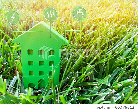 Miniature home and symbols of public utilities. Choosing a house to buy, assessing the cost and condition of the building. Location in the city. Repair and renovation, maintenance services. 60376612