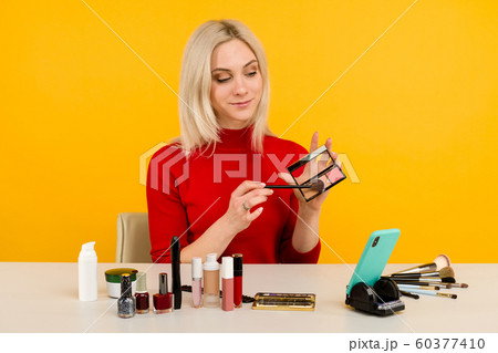 Candid shot of cute young Caucasian woman blogger Candid shot of cute young Caucasian woman blogger 60377410