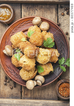 Homemade breaded mushrooms 60377469