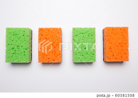 Sponge for washing dishes on a white isolated background. Sponge for washing dishes on a white isolated background. 60381508