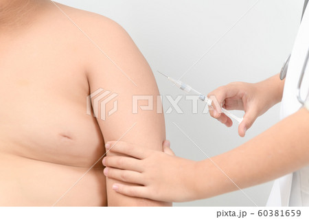 Doctor prepare injecting vaccination in arm of 60381659