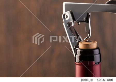 Corkscrew and bottle of wine Corkscrew and bottle of wine 60381806