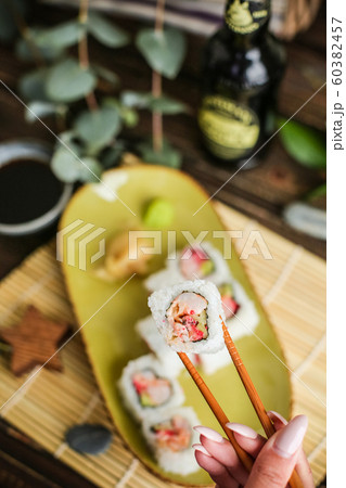 sushi with salmon and avocado. Sushi roll with salmon and tempura shrimp sushi with salmon and avocado. Sushi roll with salmon and tempura shrimp 60382457