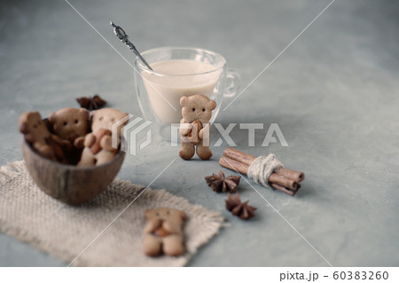 Gingerbread cookies biscuits bear holding paws Gingerbread cookies biscuits bear holding paws 60383260