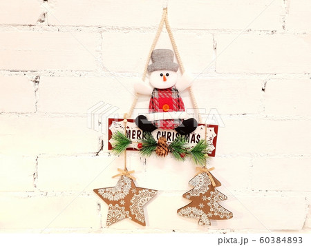 Snowman, inscription and Christmas decorations Snowman, inscription and Christmas decorations 60384893