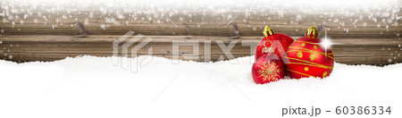 Red Bauble Branch on Wooden Background 60386334