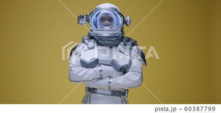 Man showing thumbs up in space suit 60387799