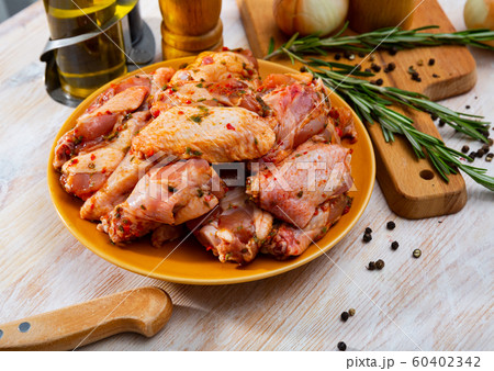 Fresh raw chicken meat marinated before frying shish kebab Fresh raw chicken meat marinated before frying shish kebab 60402342