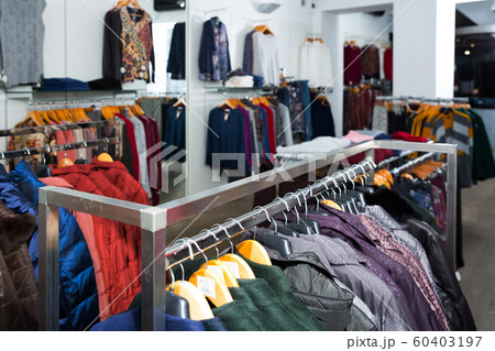 Stand with various coats Stand with various coats 60403197