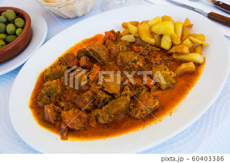 Braised pork cheeks with gravy 60403386