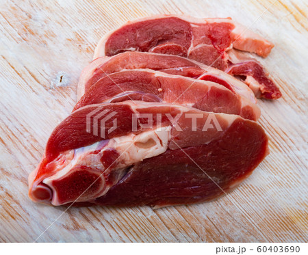 Raw lamb leg steaks Raw lamb leg steaks 60403690