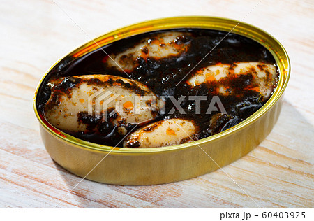 Pickled chipirones in ink Pickled chipirones in ink 60403925