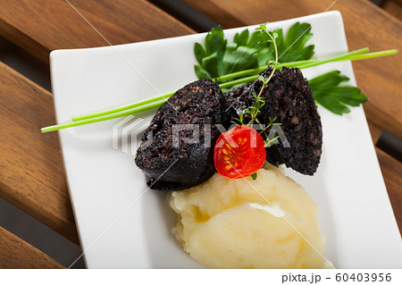 Black pudding with rice Black pudding with rice 60403956