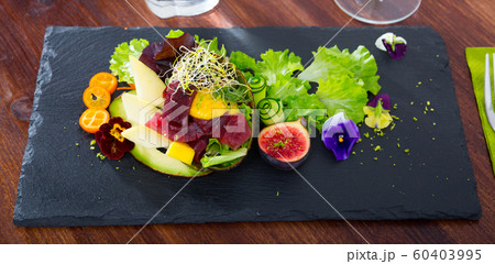 Tuna salad with avocado and mango Tuna salad with avocado and mango 60403995